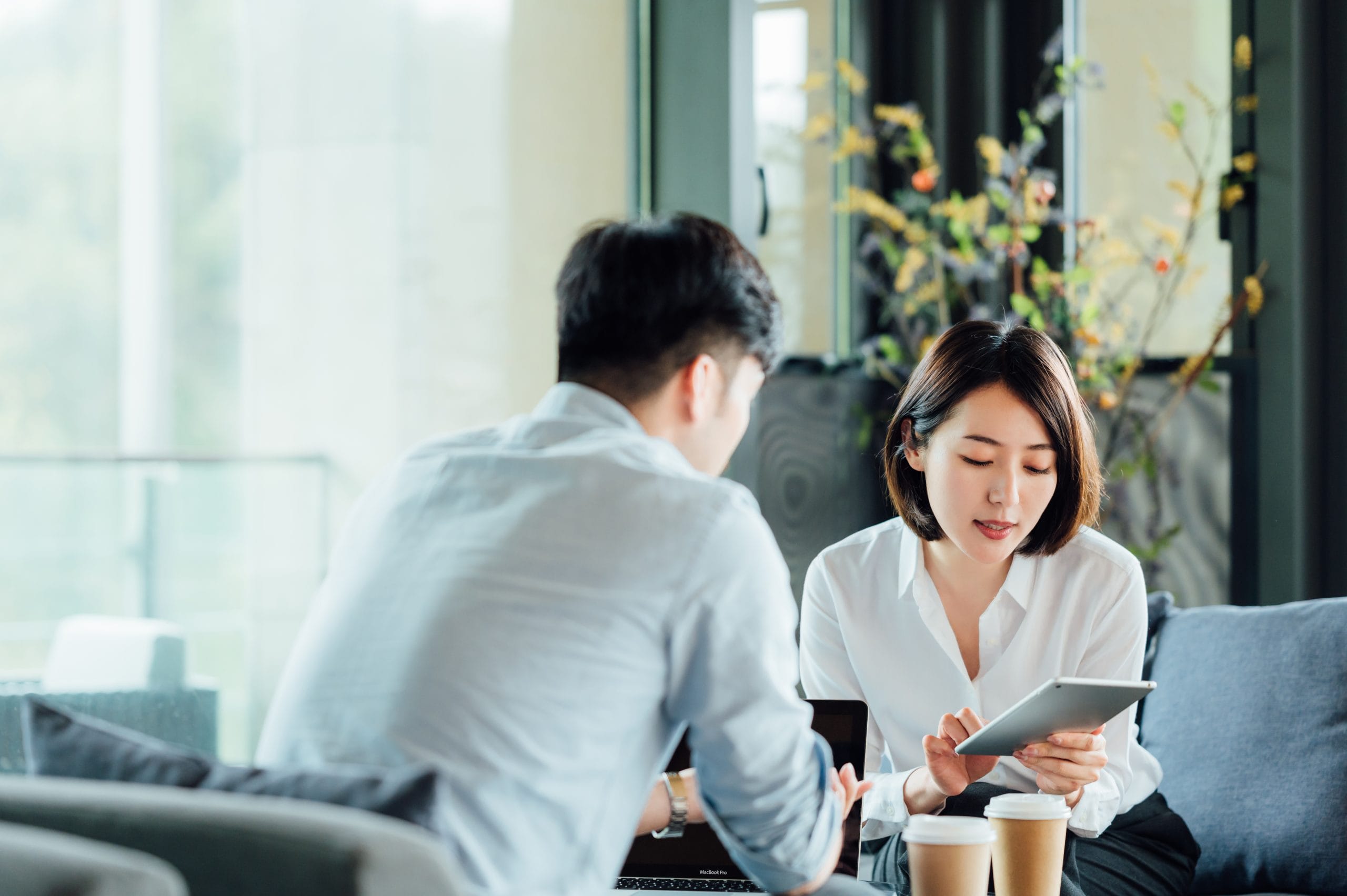 Two business people talking